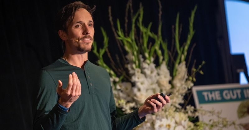 Kyle Gray speaking on stage